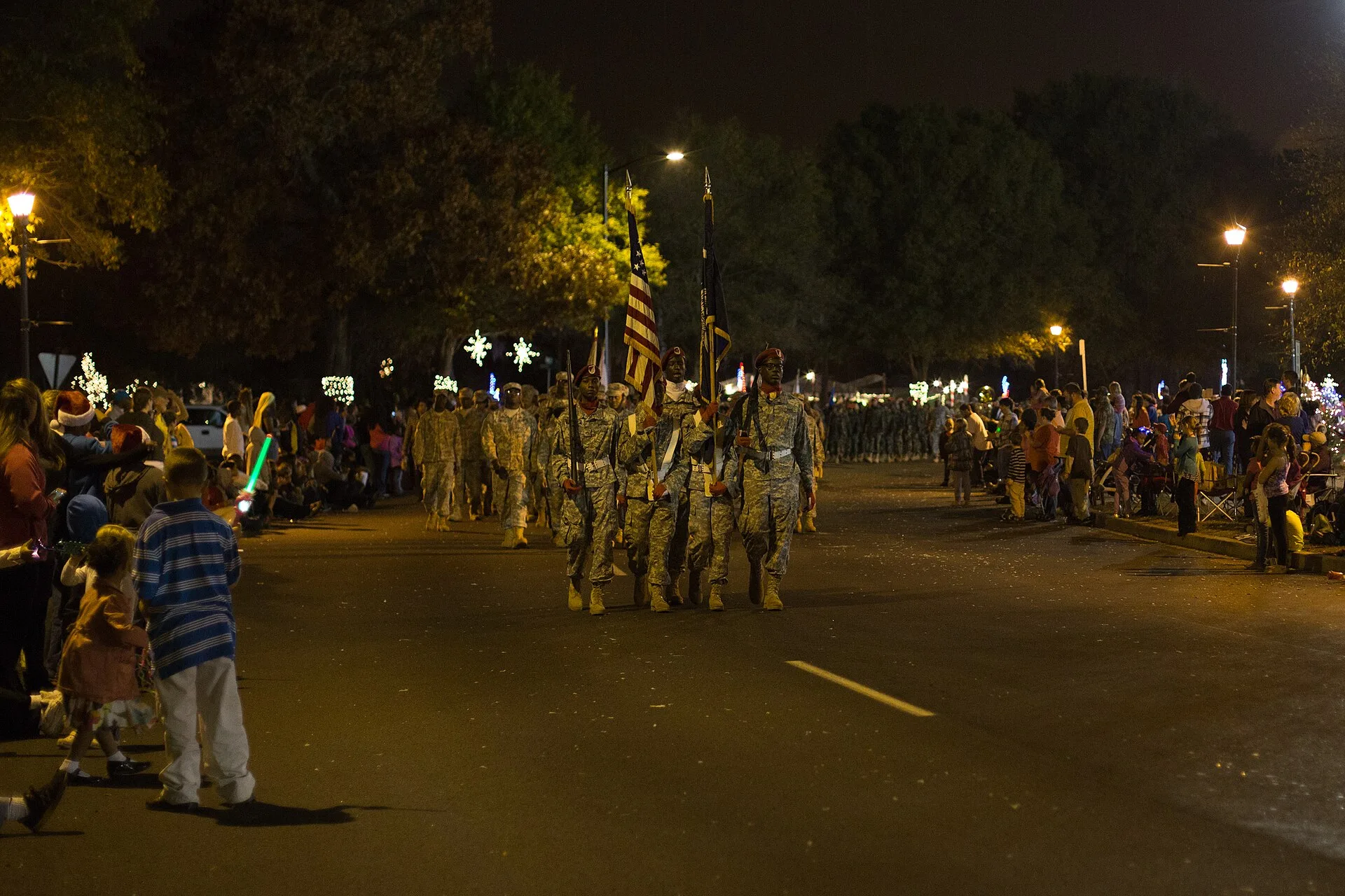 A color guard marches in the North Charleston Christmas Parade in Park Circle. The picture does not show Charleston's parade.