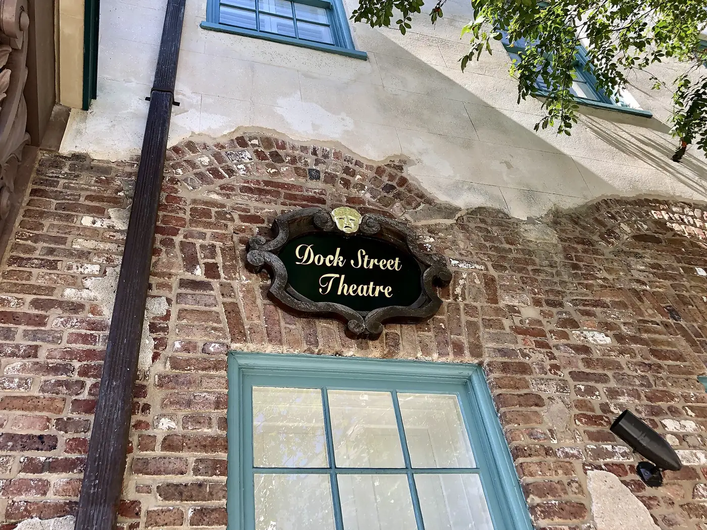The sign over a window of the Dock Street Theatre on Church Street in Charleston's French Quarter.