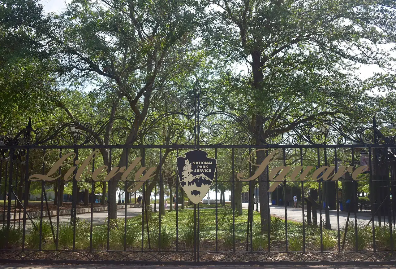 The entrance gate to Liberty Square on Concord Street, designed by blacksmith Philip Simmons, where the parade ends.