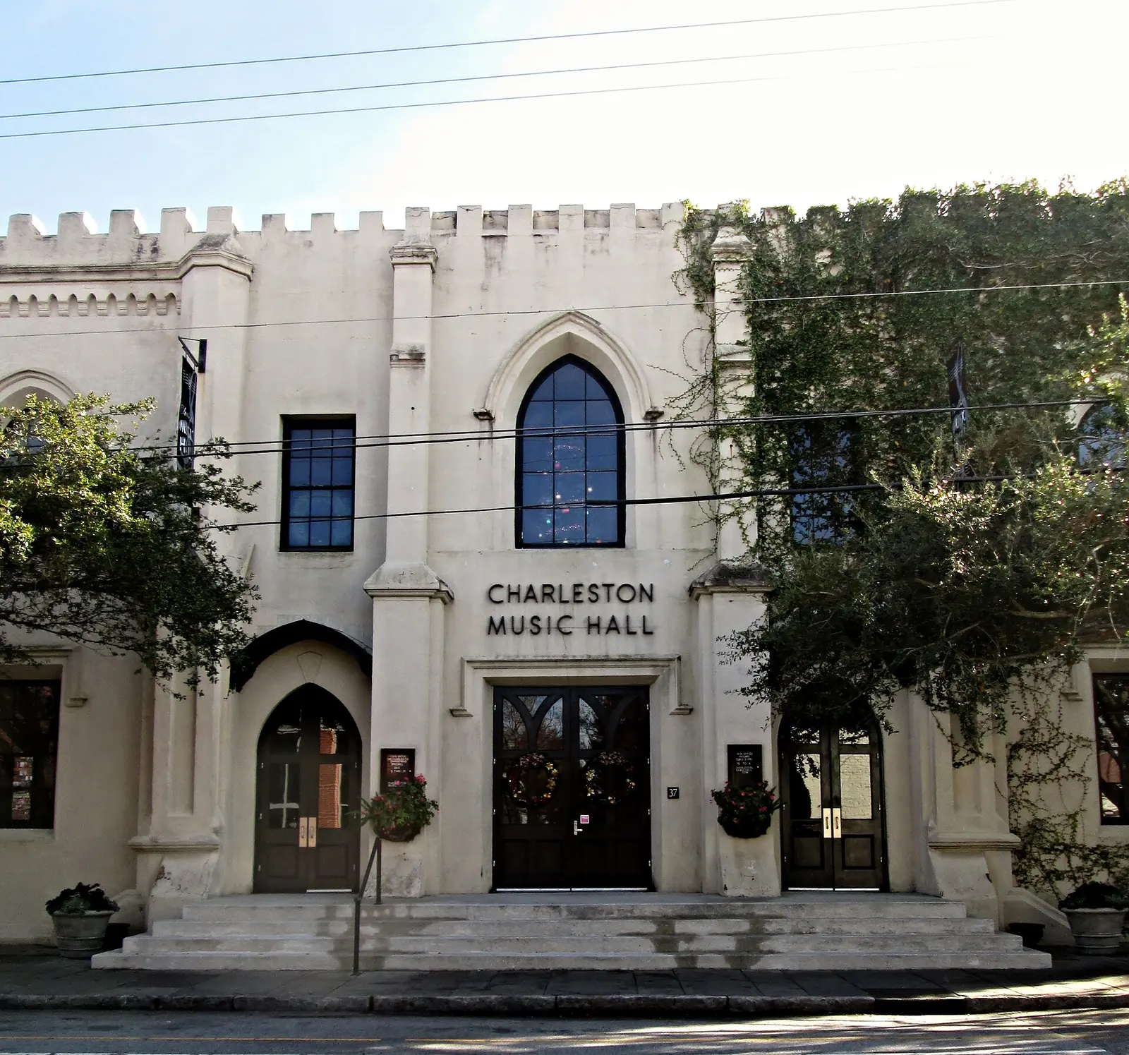 The Gothic Revival front of the Charleston Music Hall, a former railroad depot, on John Street in downtown Charleston.