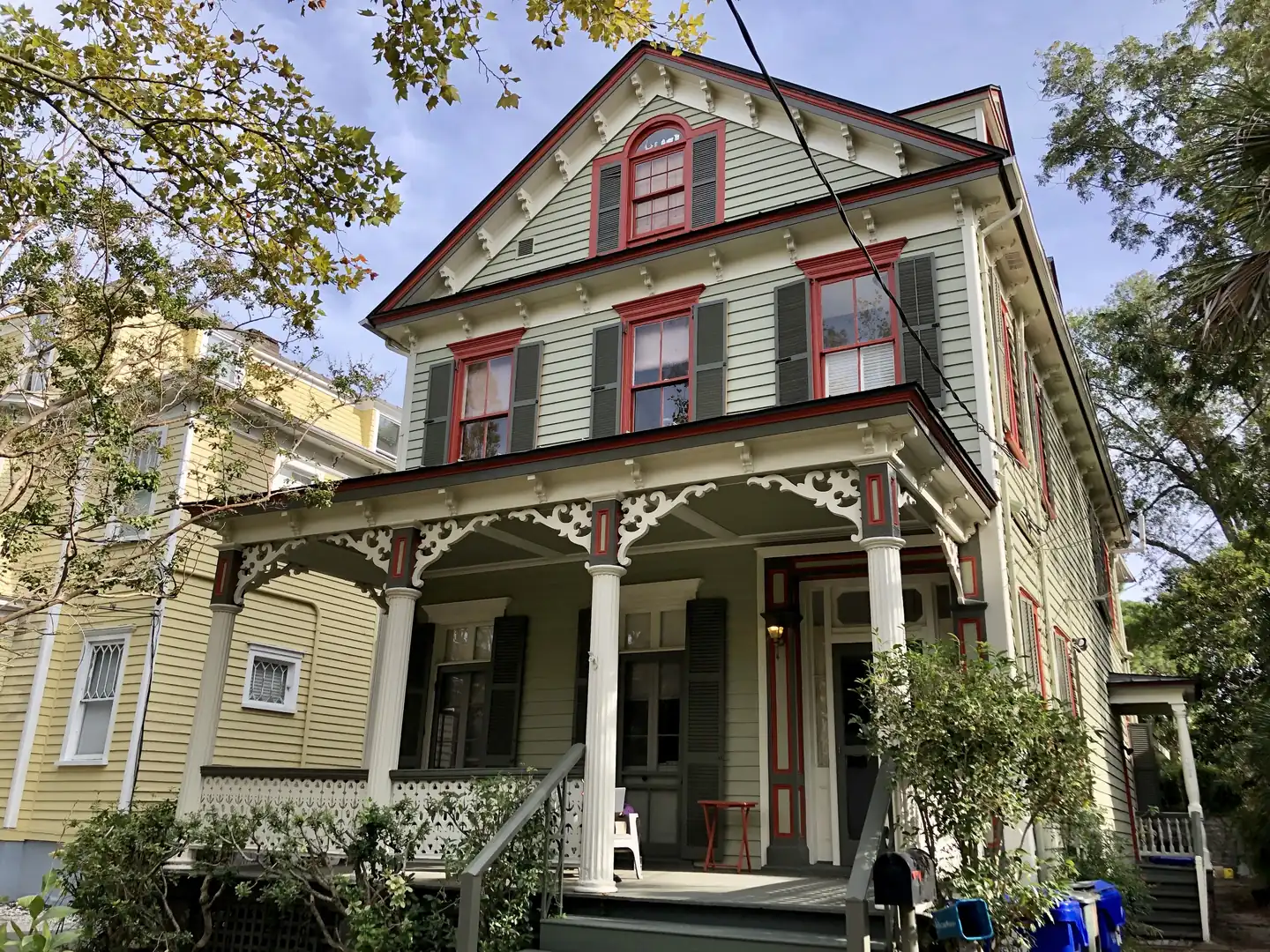 A two-story house with a front porch on Bull Street in Harleston Village, downtown Charleston.