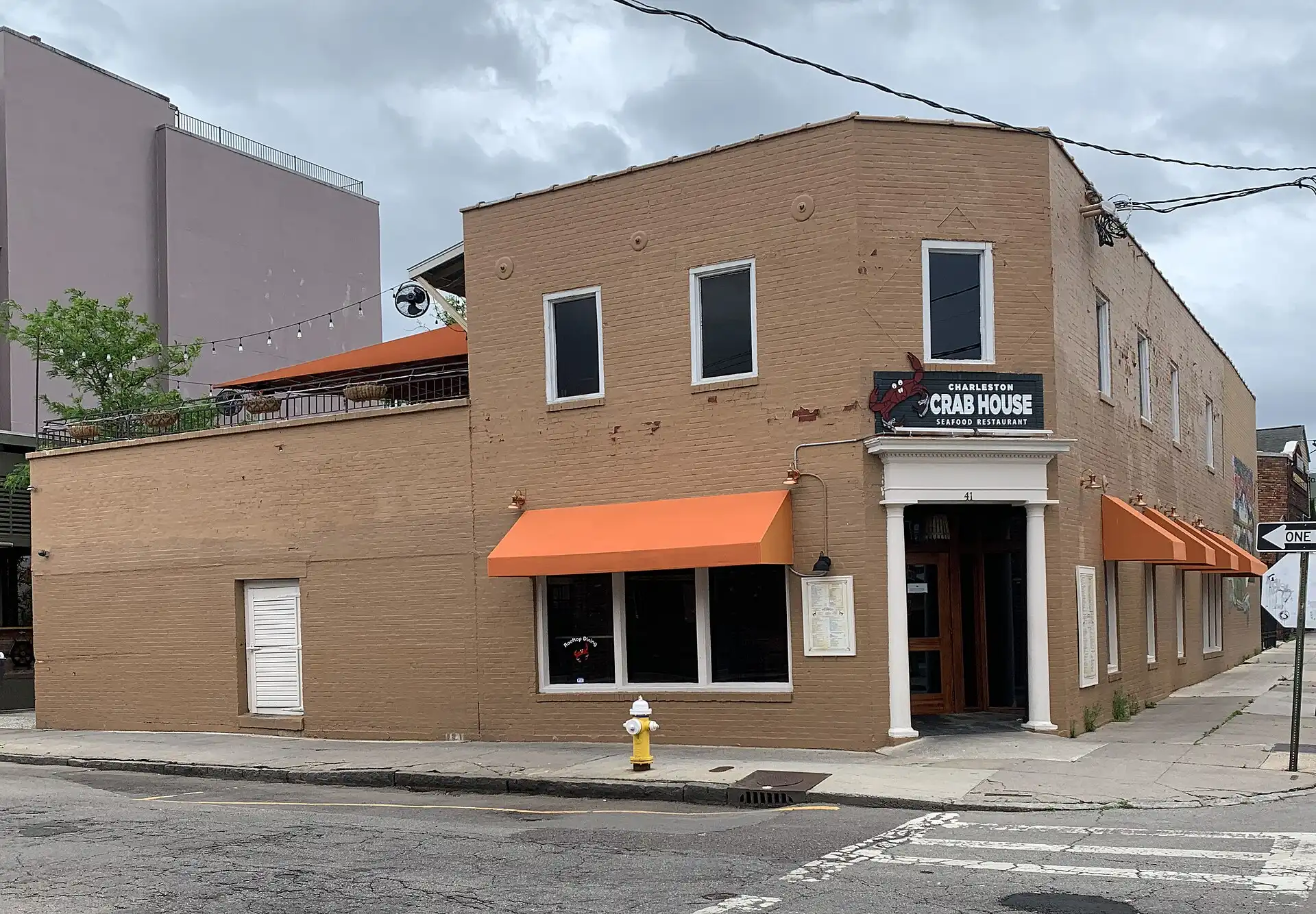 Charleston Crab House at 41 S. Market St., with its rooftop dining deck at upper left.