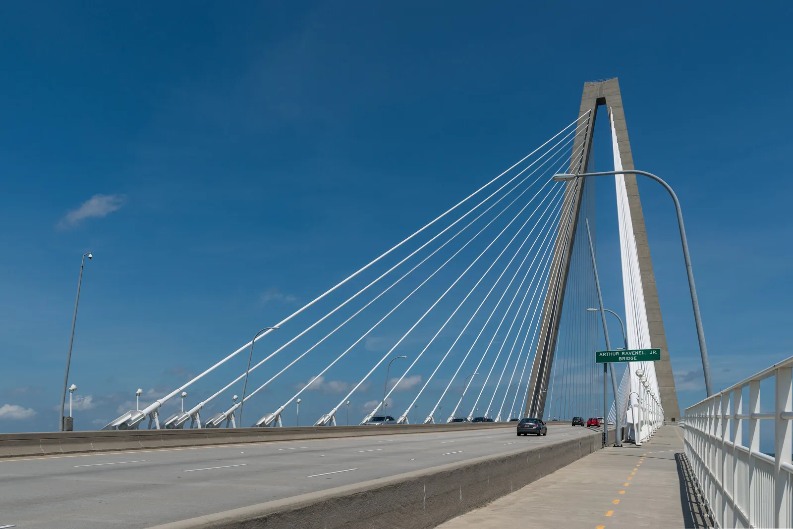 The Wonders' Way walking and biking path beside the traffic lanes on the Arthur Ravenel Jr. Bridge over the Cooper River.