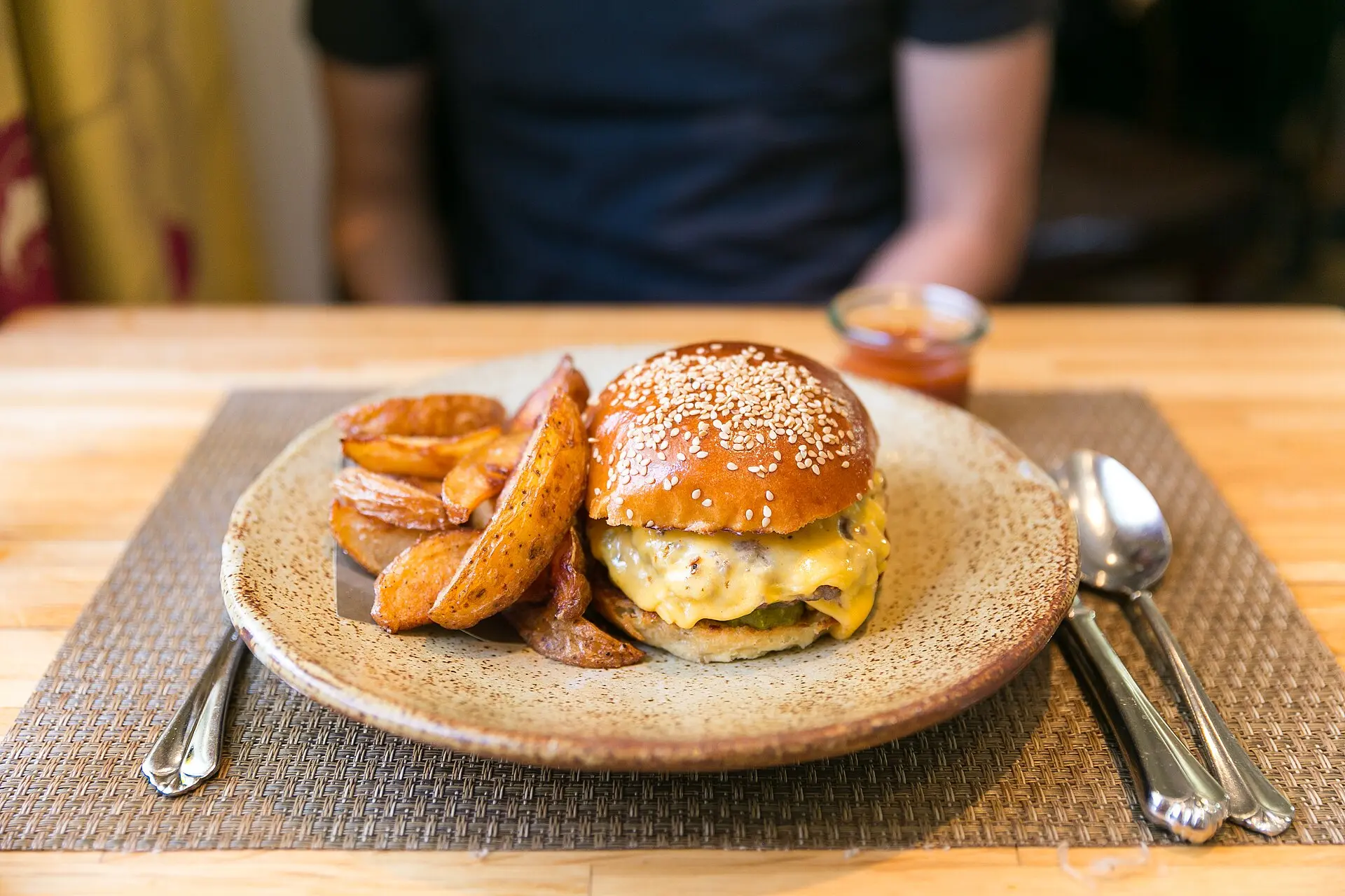 A cheeseburger with fried potato wedges at Husk in downtown Charleston, a restaurant not on this list.